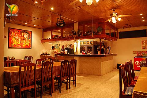 Ya-Nui Resort Restaurant: We shot these pictures a late night when everybody had gone home. We have redone
  the interiour design of the restaurant, but kept the menu that made the place
  a local leader.